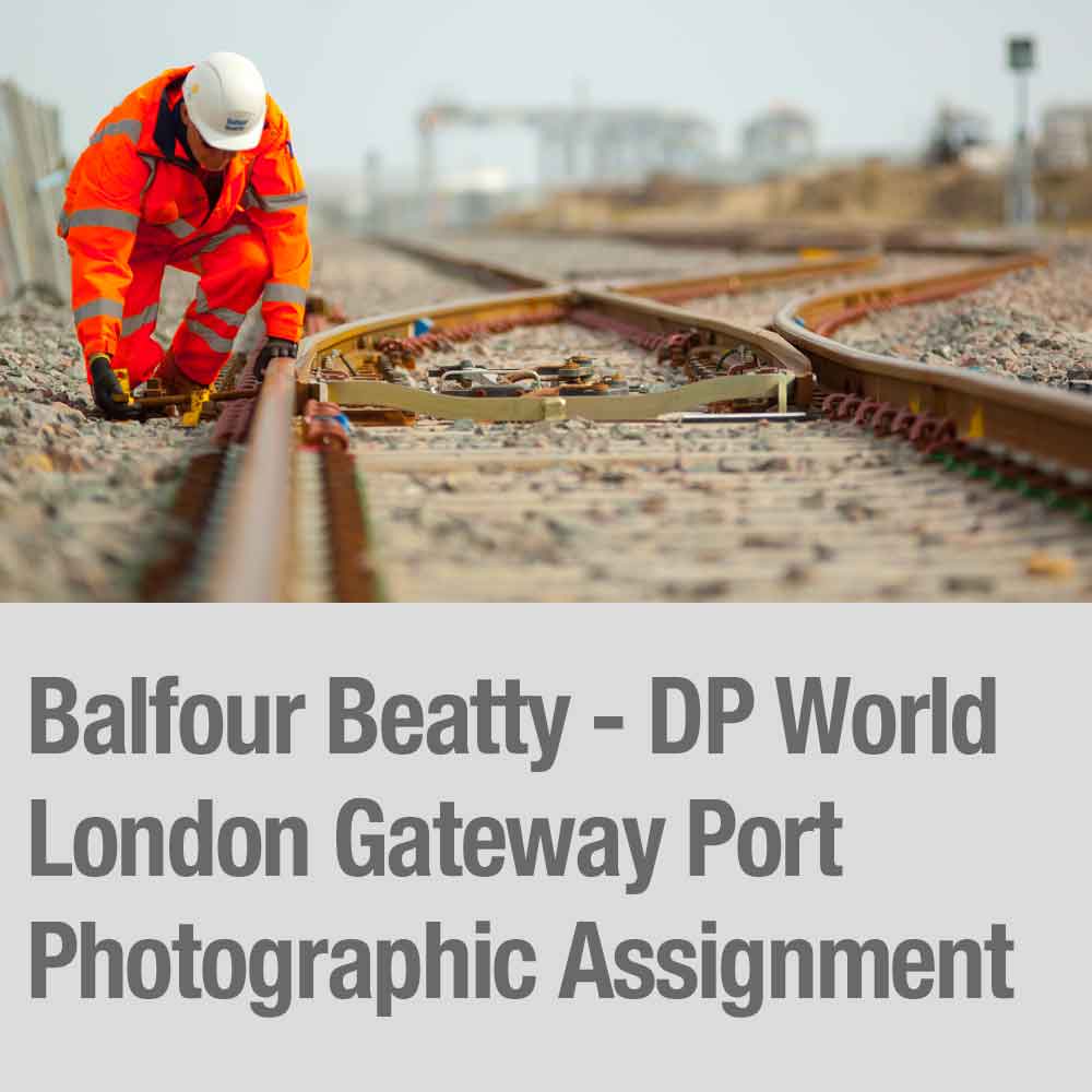 Industrial photographer image button checking the railway points