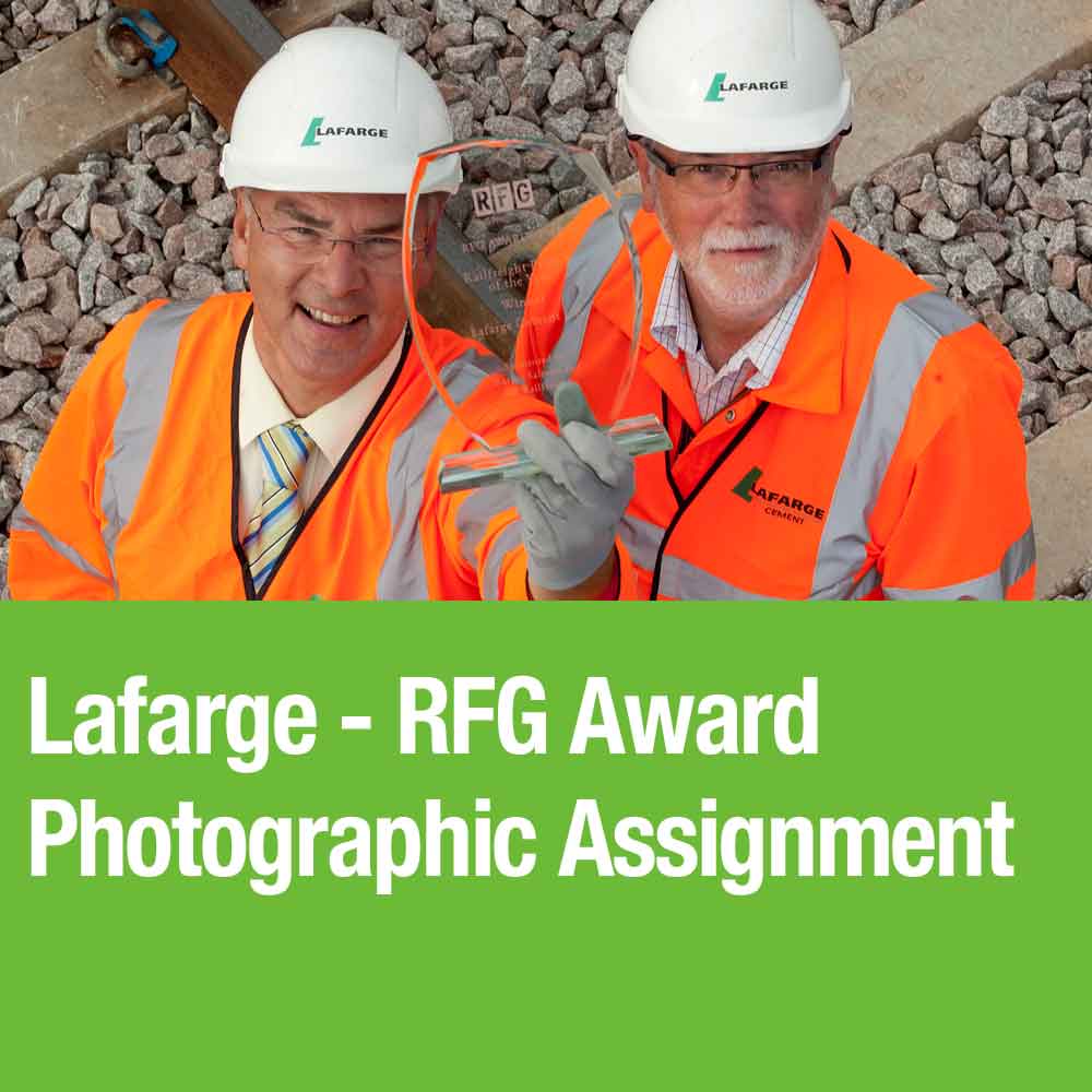 commercial photographer image button Corporate award held up to camera
