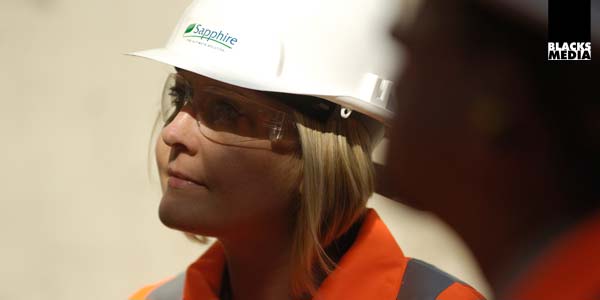 Executive site visit photography Corporate employee on worksite