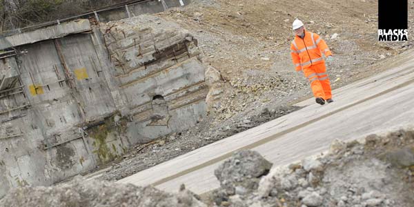 Employee photography surveying worksite